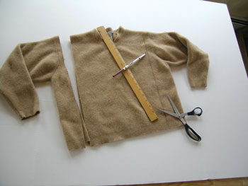 Cut out large rectangles of the fabric. Cut the pieces so that one direction measures 12 inches wide. (Hint: Long, uniform strips are easier to assemble.)